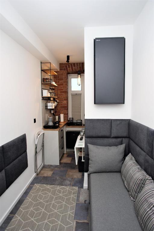 Kuchyňa alebo kuchynka v ubytovaní Mikro Apartament Solo na Starówce 8m2