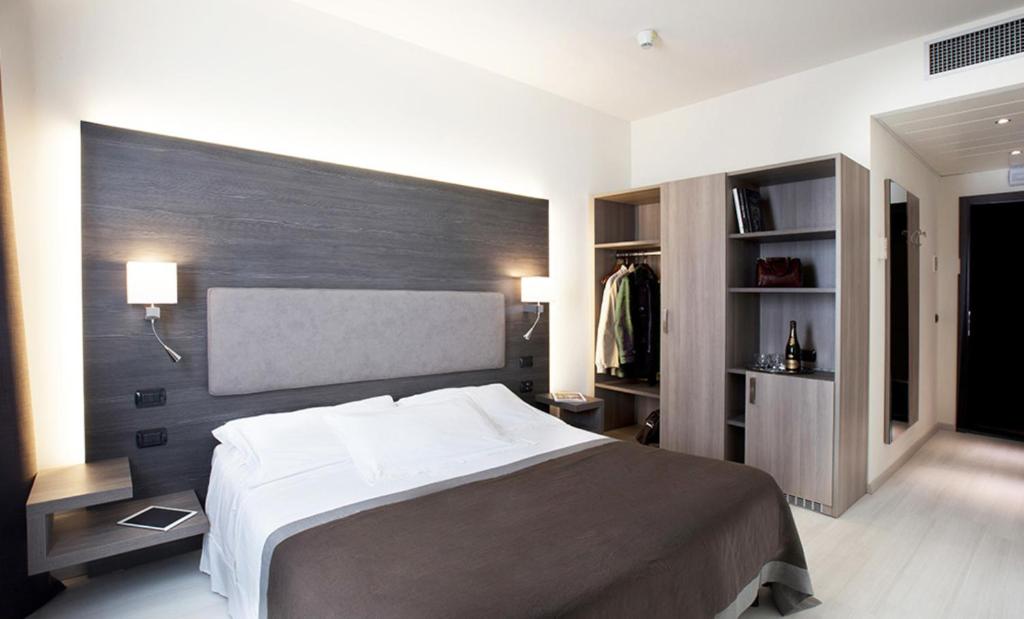 Una cama o camas en una habitación de Hotel Giardino