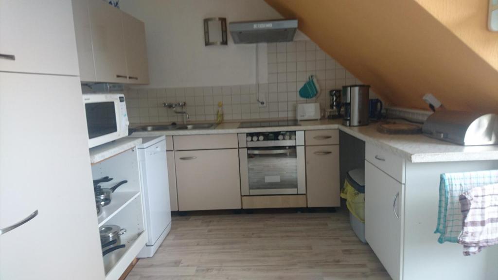 Kuchyň nebo kuchyňský kout v ubytování Kummerower See