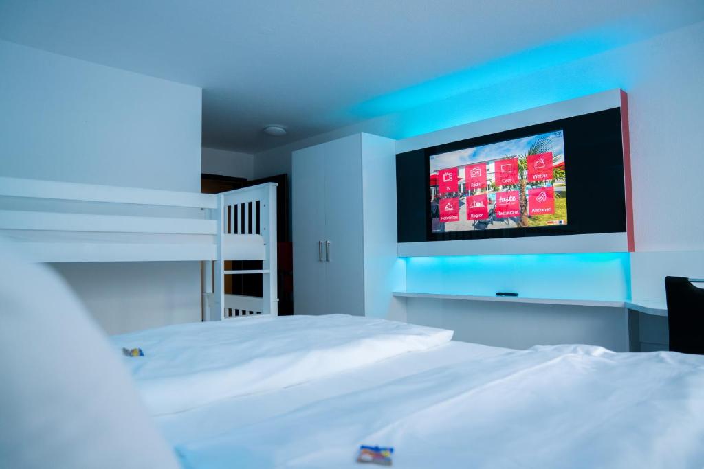 Postel nebo postele na pokoji v ubytování Hotel Andante Rust