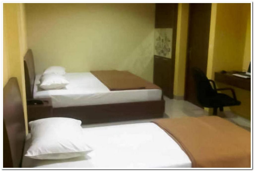 The Nancy's Homestay Pekanbaru Mitra RedDoorz - Habitación Familiar