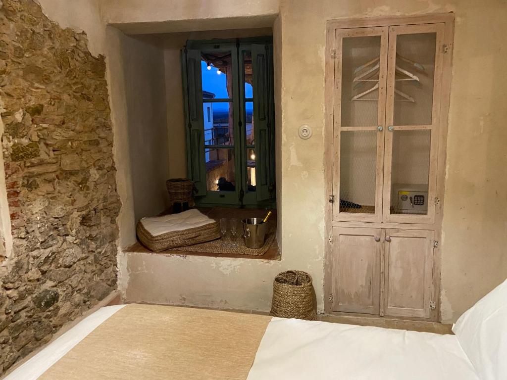A bed or beds in a room at Can Massana