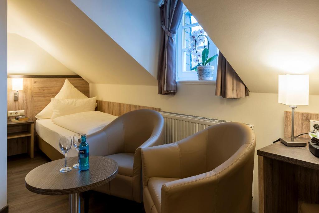 Posezení v ubytování Hotel Ratskeller Schwarzenberg