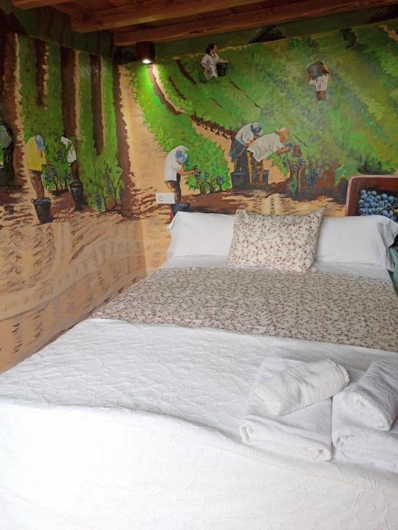 Postel nebo postele na pokoji v ubytování Casa Rural La Bodega