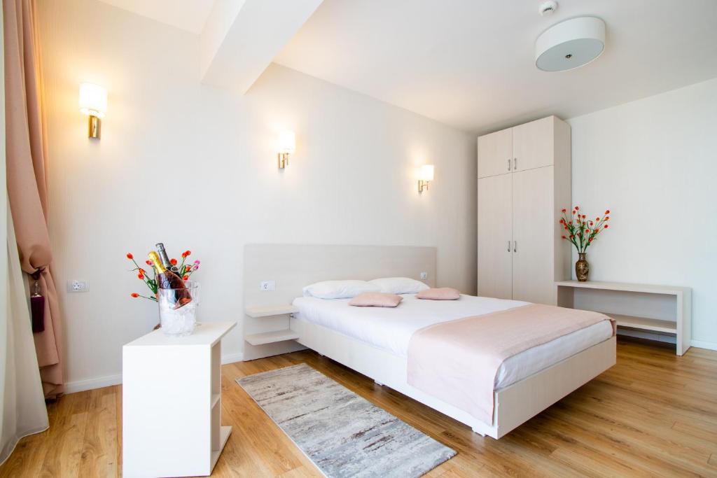 Postel nebo postele na pokoji v ubytování Hotel Bulevard