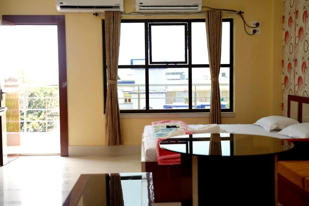 Postel nebo postele na pokoji v ubytování Hotel Royal Sunview