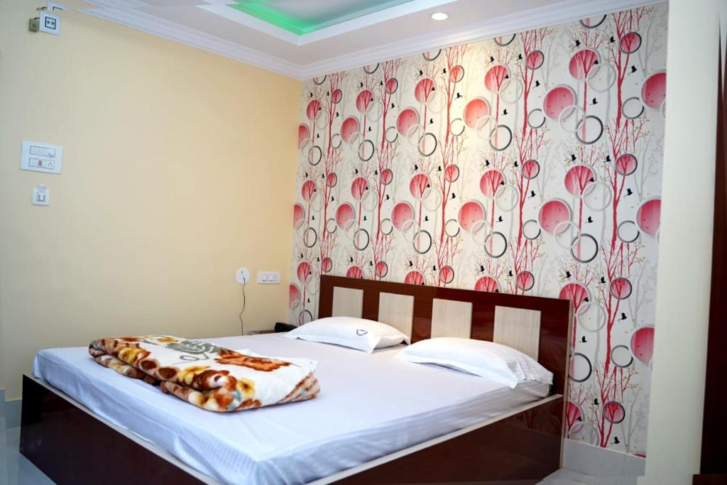 Postel nebo postele na pokoji v ubytování Hotel Royal Sunview