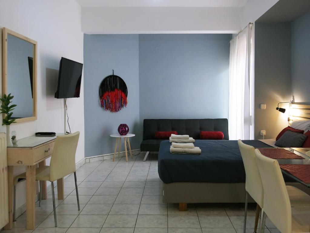 A television and/or entertainment centre at Halepa Apartments