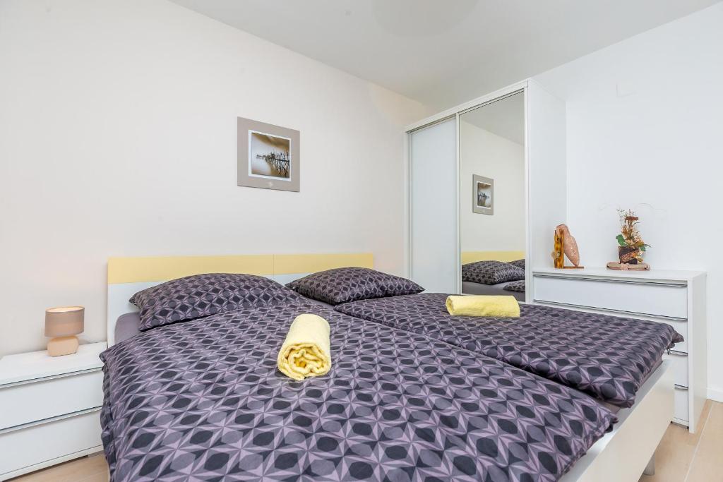 Postel nebo postele na pokoji v ubytování Villa Antonela