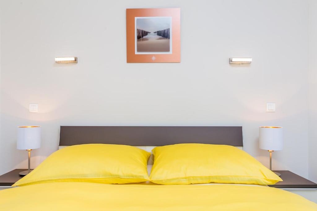 Postel nebo postele na pokoji v ubytování Villa Antonela