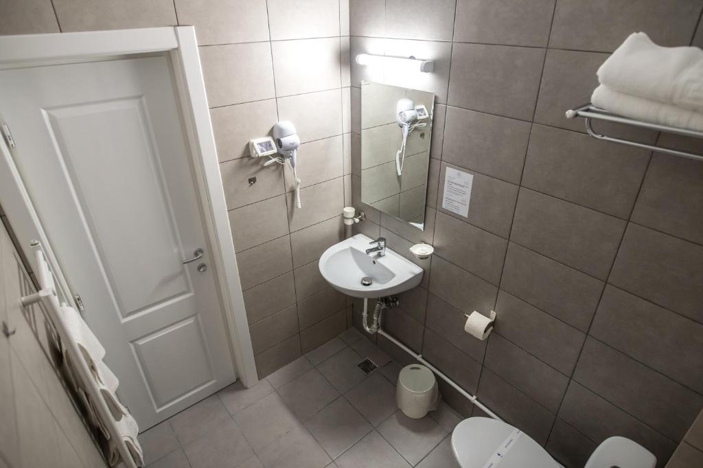 Koupelna v ubytování Hotel Tadora