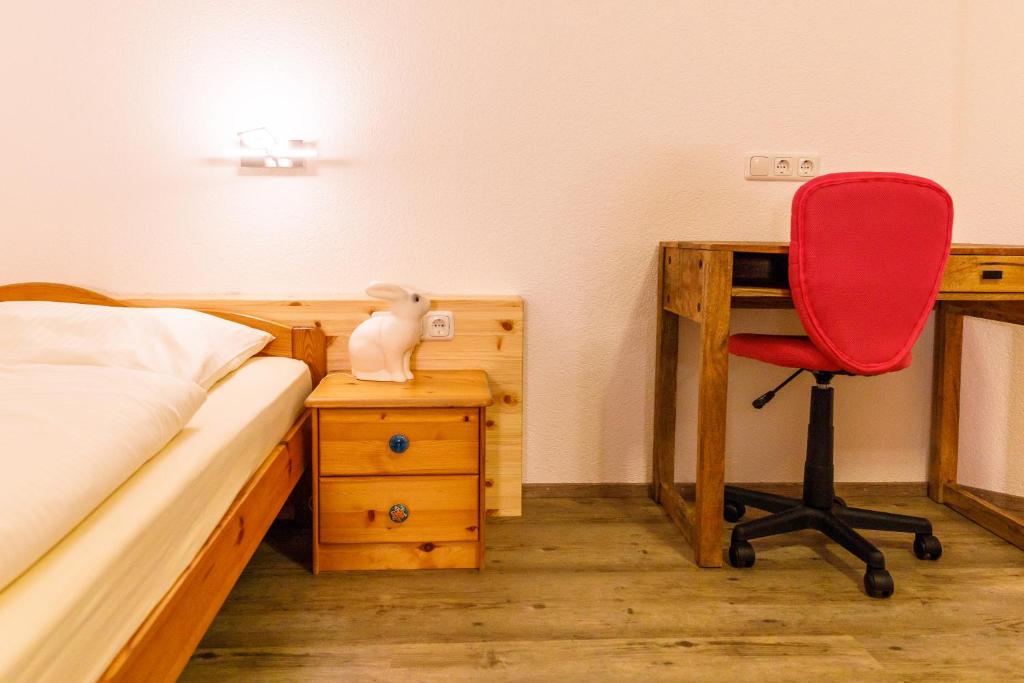 Postel nebo postele na pokoji v ubytování Allgäu-Hotel-Elbsee