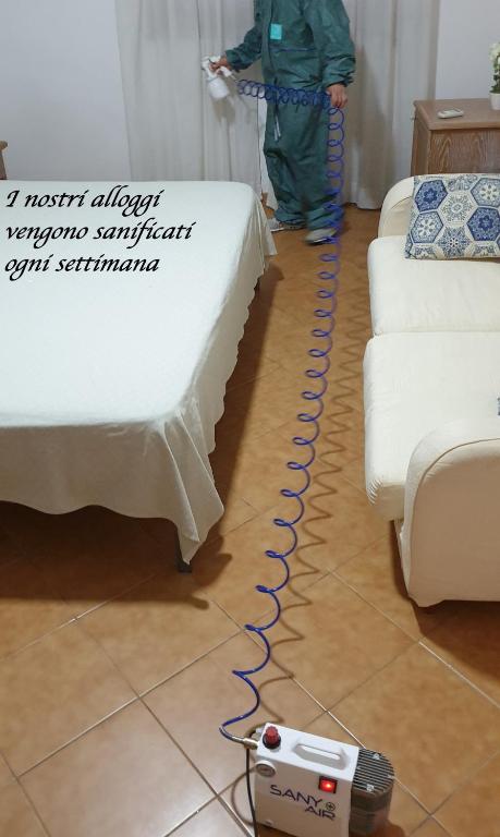 Postel nebo postele na pokoji v ubytování Grand Hotel Pavone