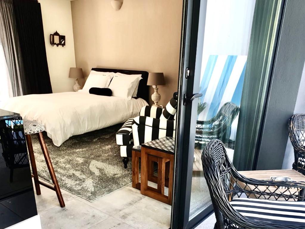 Cama ou camas em um quarto em Maison Cabral