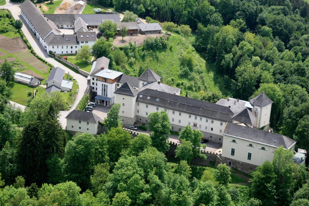 an aerial view of a village with buildings and trees at Kloster Wernberg in Wernberg