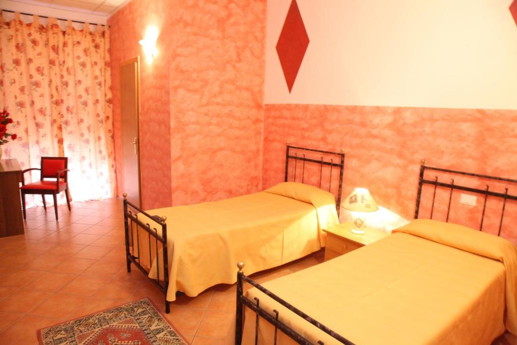 Postel nebo postele na pokoji v ubytování B&B Rinascente