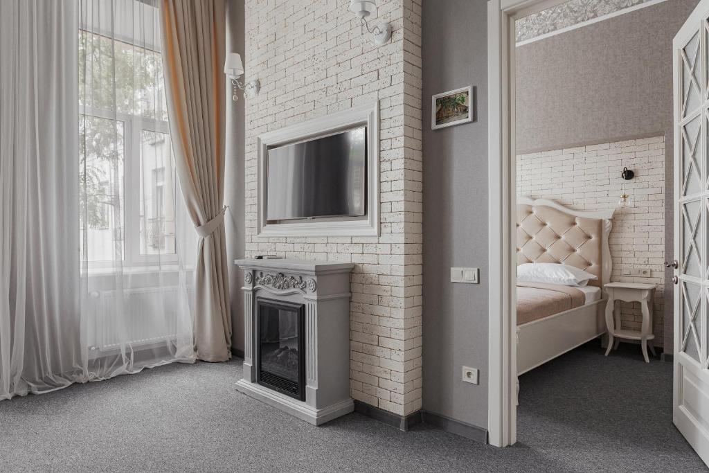 Postel nebo postele na pokoji v ubytování Apartments MaisoNº11