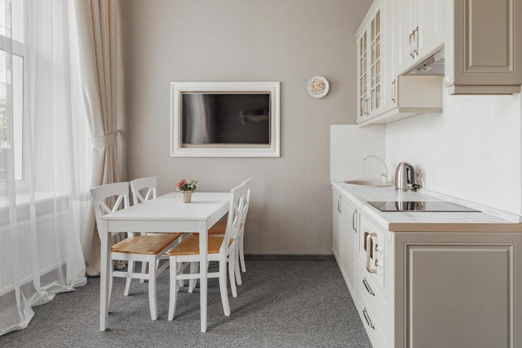 Kuchyň nebo kuchyňský kout v ubytování Apartments MaisoNº11