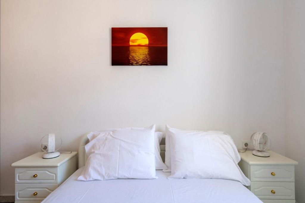 A bed or beds in a room at Panoramic View House