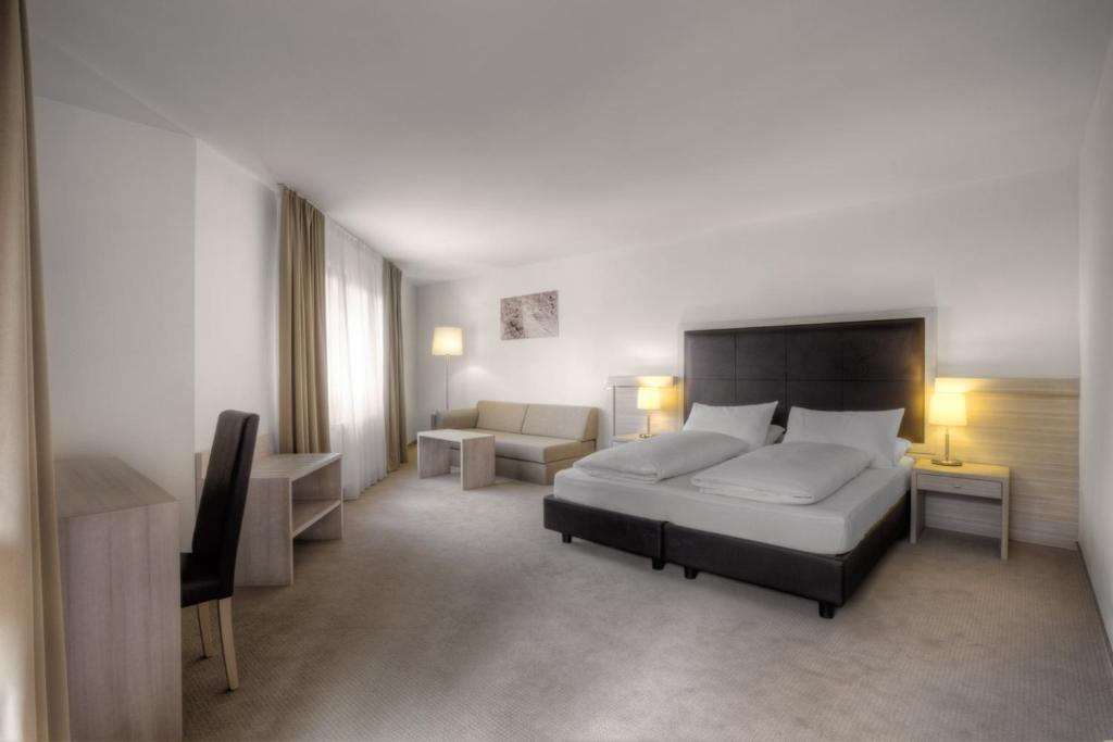 Postel nebo postele na pokoji v ubytování Hotel La Tambra