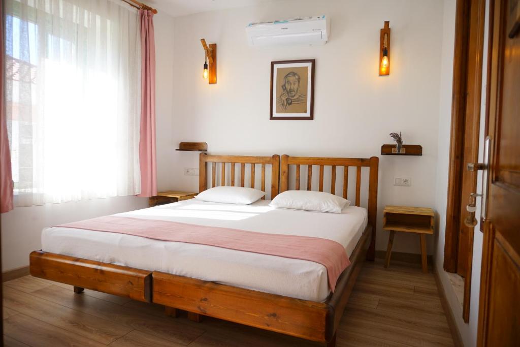 Postel nebo postele na pokoji v ubytování Ayışığı Hotel