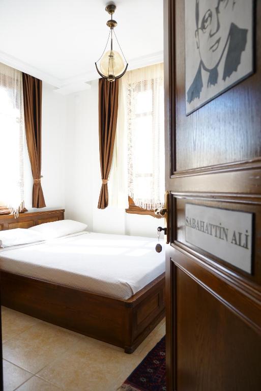 Postel nebo postele na pokoji v ubytování Ayışığı Hotel
