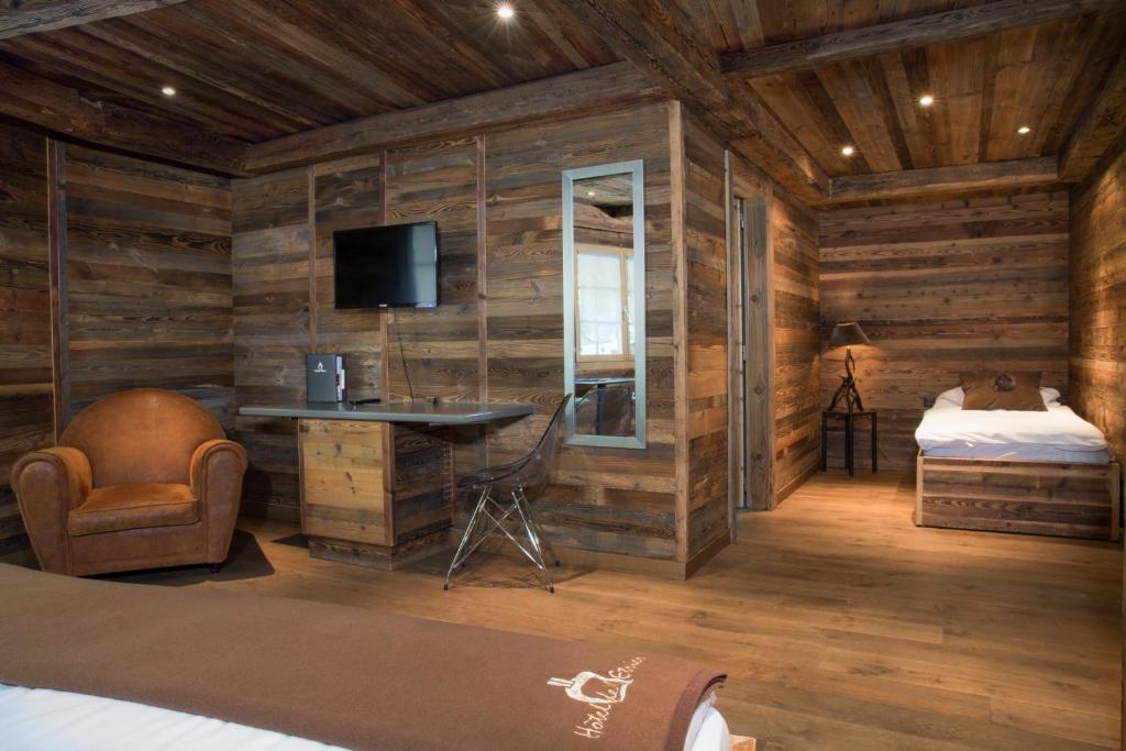Postel nebo postele na pokoji v ubytování Hotel Etrier