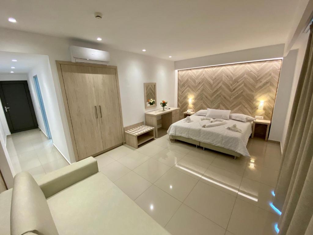Postel nebo postele na pokoji v ubytování Agrelli Hotel & Suites