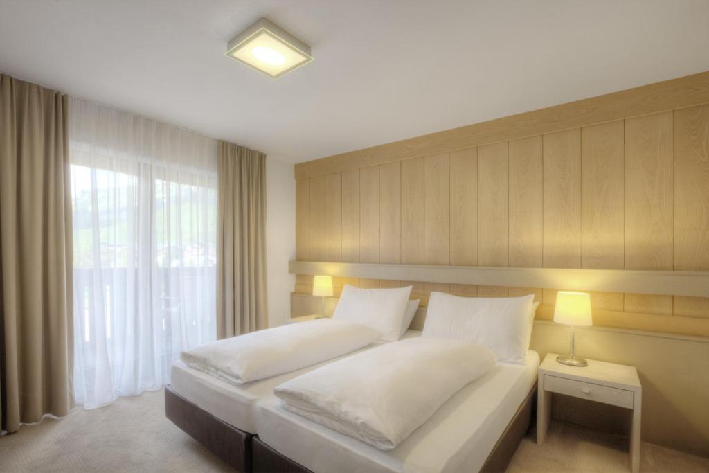 Postel nebo postele na pokoji v ubytování Hotel La Tambra