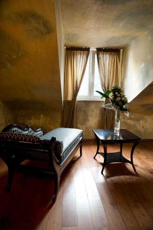 Una cama o camas en una habitación de Boutique Hotel Astoria