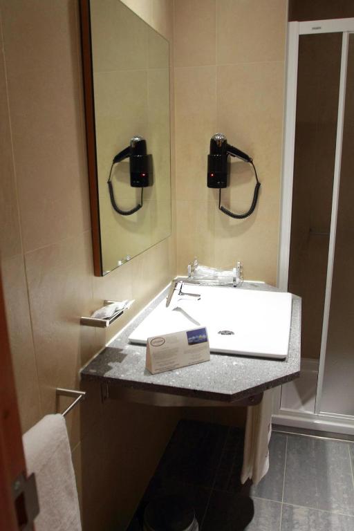 Koupelna v ubytování Hotel Comodoro