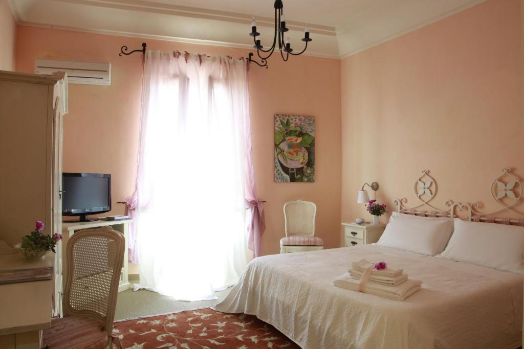Postel nebo postele na pokoji v ubytování Albergo Egadi