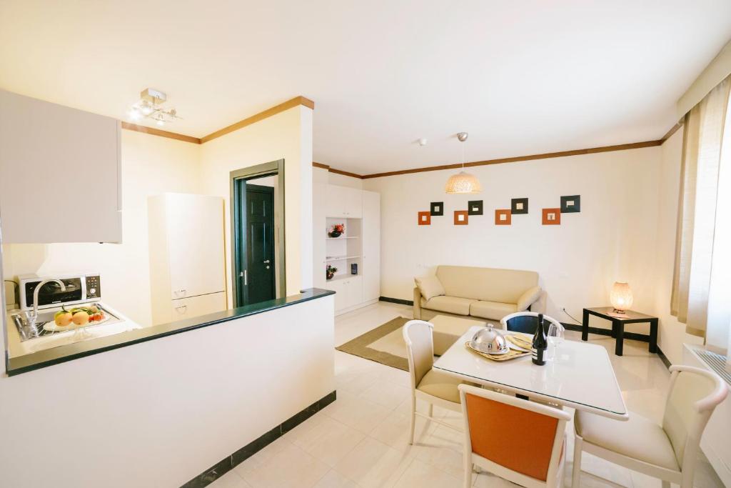 Postel nebo postele na pokoji v ubytování Hotel Residence Federiciano