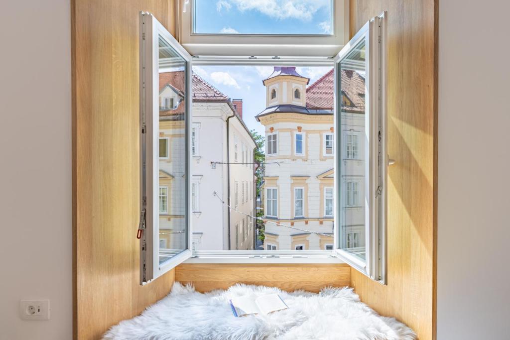 Postel nebo postele na pokoji v ubytování Old Quarter Residence