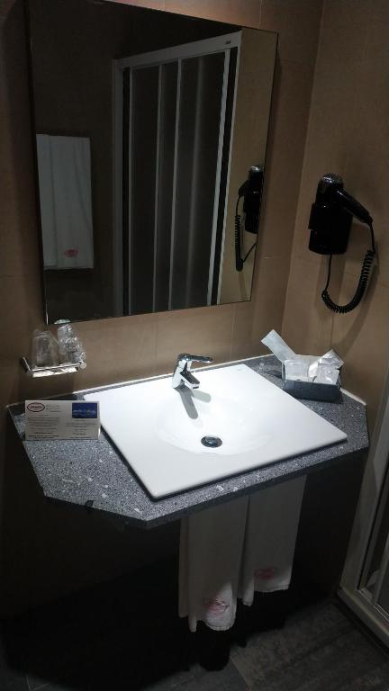 Koupelna v ubytování Hotel Comodoro