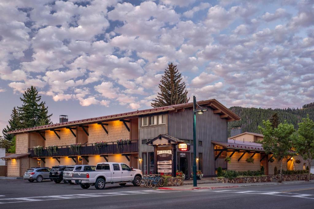 a building with cars parked in front of it at Tamarack Lodge in Ketchum