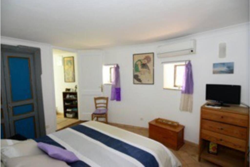 Posteľ alebo postele v izbe v ubytovaní Positano casa bella