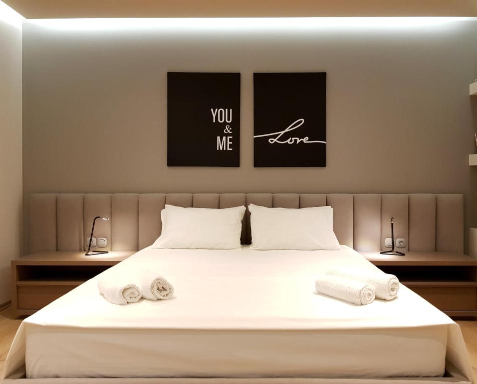 Postel nebo postele na pokoji v ubytování ArtNest Luxury Hotel & Suites