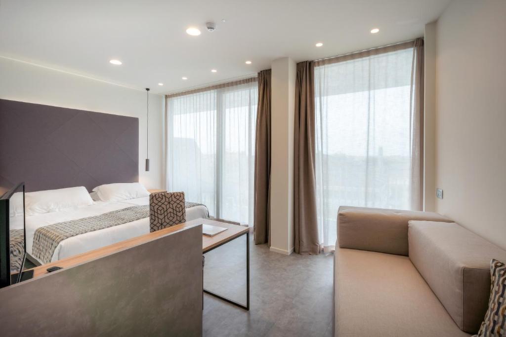 Postel nebo postele na pokoji v ubytování Hotel Garden Sea Wellness & Spa 4 stelle superior
