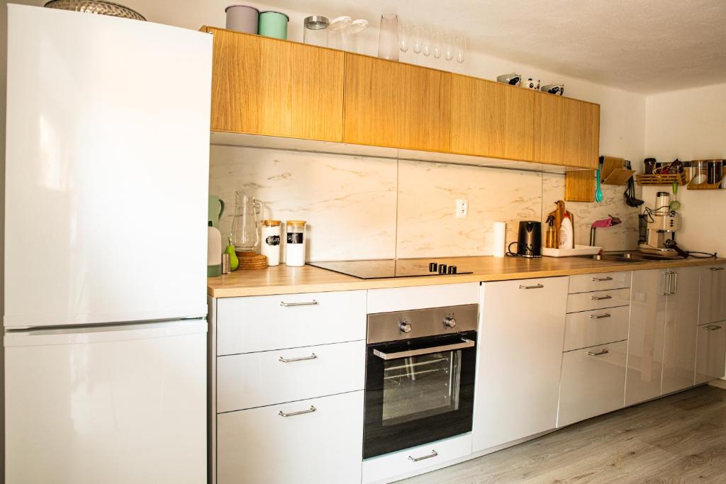 Kuchyň nebo kuchyňský kout v ubytování K-house