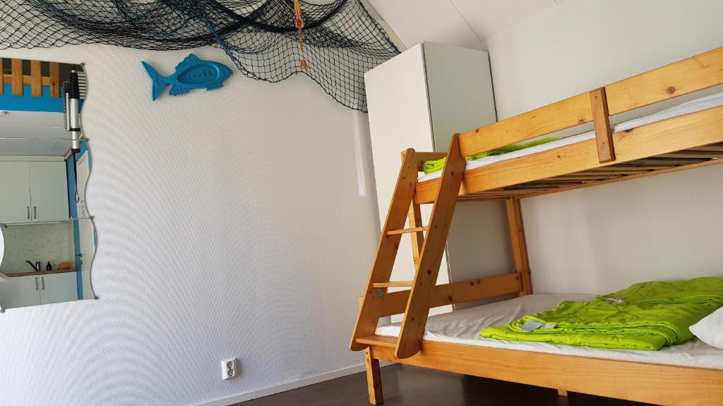 Postel nebo postele na pokoji v ubytování Lygnareds Camping