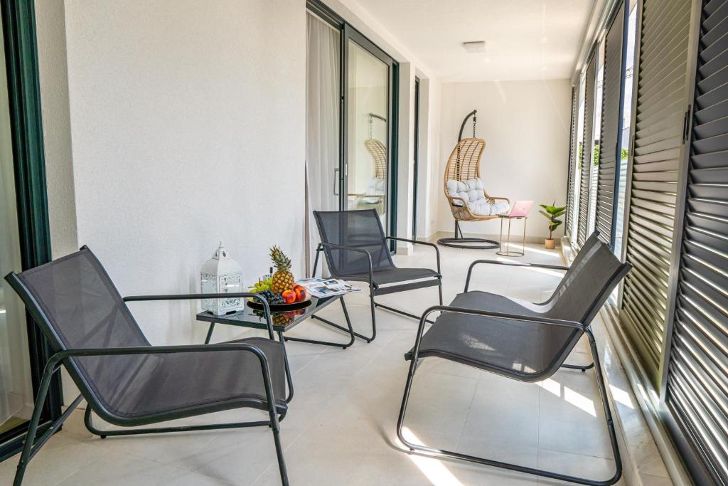 Posedenie v ubytovaní Golden Luxury Apartment