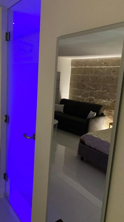 Postel nebo postele na pokoji v ubytování Recinto antico Sweet Rooms