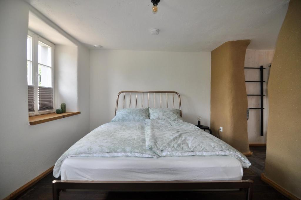 Postel nebo postele na pokoji v ubytování Ferienhaus Baustert