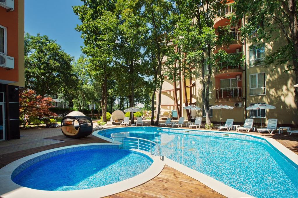 Bazén v ubytování Sunrise Hotel nebo v jeho okolí