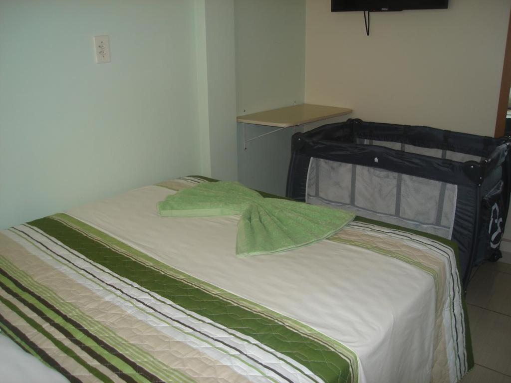 Postel nebo postele na pokoji v ubytování Hotel Alvorada