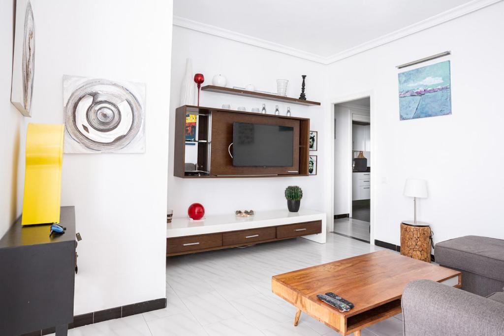 A television and/or entertainment centre at La Torre De La Roca