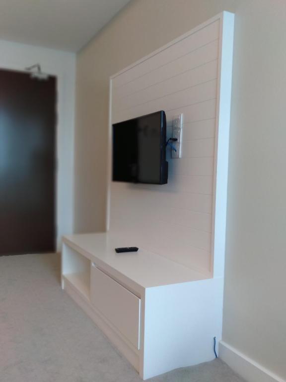 TV a/nebo společenská místnost v ubytování UTM Hotel & Residence