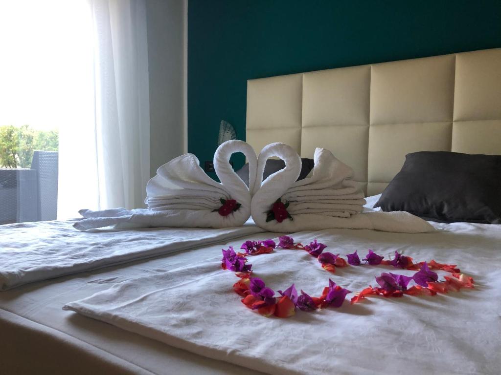 Postel nebo postele na pokoji v ubytování Hotel San Giorgio