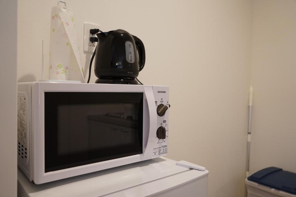 Culinary Bed&Art2 403にあるテレビまたはエンターテインメントセンター